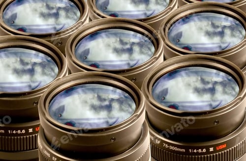 Preview: Camera Lenses With A Blu Sky Reflection