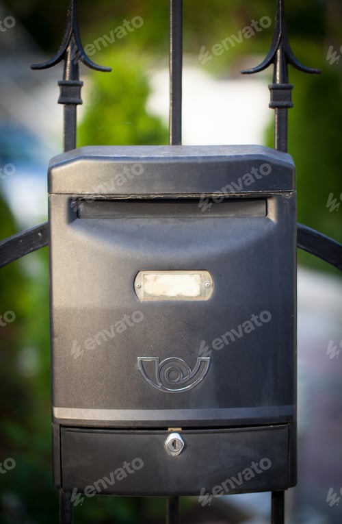 Preview: Cloes Up Of A Mailbox On The Street With Fence