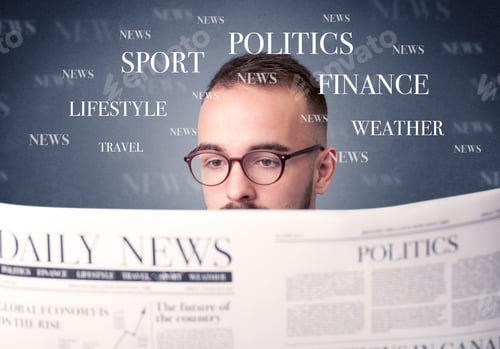 Preview: Young Smart Businessman Reading Daily Newspaper