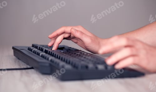 Preview: Close Up Of Hand Pressing Keyboard Buttons On Desk