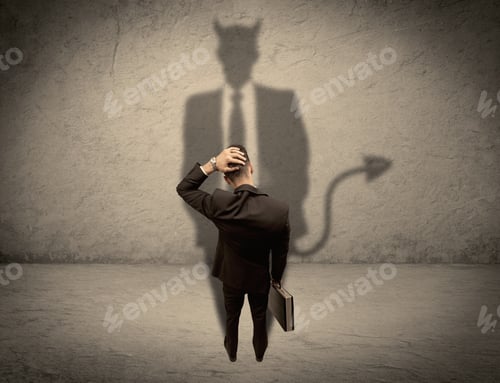 Preview: An Experienced Tricky Businessman In Suit Looking At His Devil Desguise Shadow Reflected On The