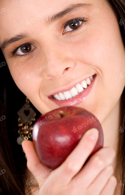 Preview: Portrait Of A Girl Holding An Apple Smiling