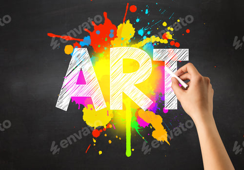 Preview: Female Hand Holding White Chalk In Front Of A Blackboard With Art Written On It And A Colorful
