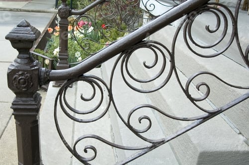 Preview: Iron Railing With Filigree In Front Of Urban Walkup