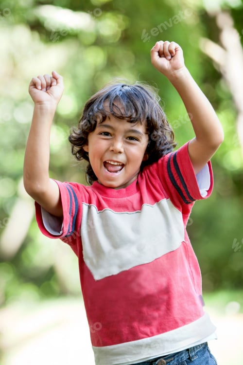 Preview: Happy Boy At The Park With Hands Up And Smiling