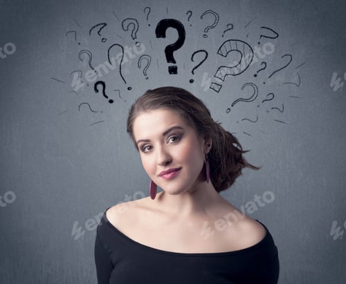 Preview: A Pretty Teenage Girl Standing Confused In Front Of Grey Wall Background With Drawn Question Marks
