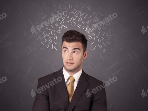 Preview: Young Businessman With White Alphabet Around His Head