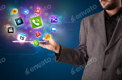 Preview: Young Businessman Holding A Tablet With Modern Colorful Apps And Icons