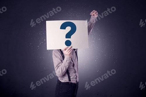 Preview: Young Businessman Hiding Behind A Question Mark Drawn On Paper