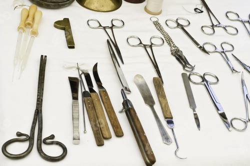Vintage Surgical Tools on a White Background