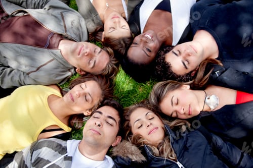 Preview: Circle Of Friends With Their Heads Together On The Floor