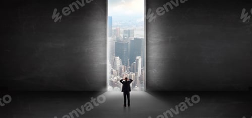 Preview: Businessman Standing In A Dark Room And Looking Outside To A Cityscape View