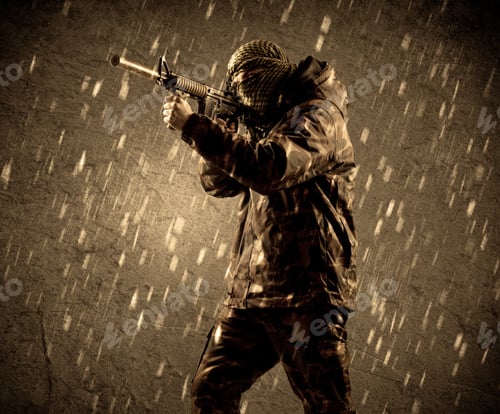 Preview: Portrait Of Dangerous Heavily Armed Terrorist Soldier With Mask On Grungy Rainy Background