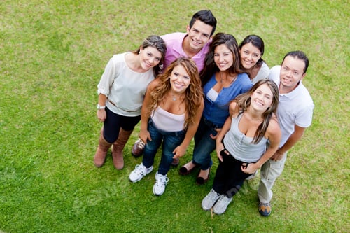 Preview: Group Of Young People Standing Outdoors Smiling