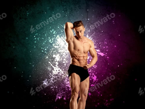 Preview: A Sexy Male Fitness Trainer Showing His Muscles And Looking Seductive With A Weight In His Hands In