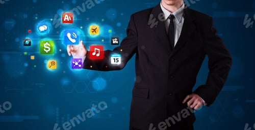 Preview: Young Businessman Pressing Various Collection Of Buttons