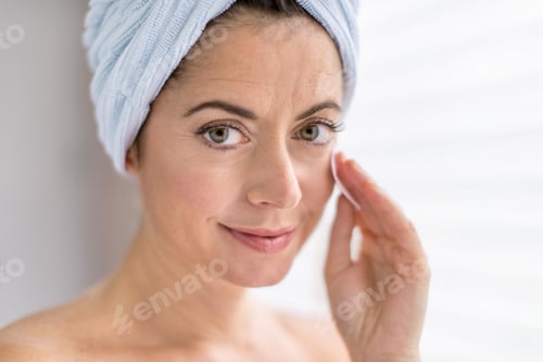 Preview: Attractive Woman In Her Forties Removing Make Up