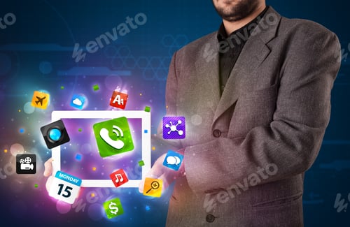 Preview: Young Businessman Holding A Tablet With Modern Colorful Apps And Icons