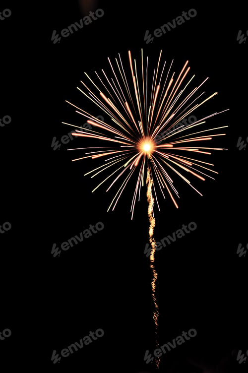 Preview: Multicolored Burst Of Fireworks With White-Hot Core Of Explosion And Reddish Orange Rocket Trail
