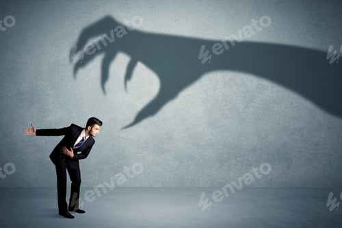 Preview: Business Person Afraid Of A Big Monster Claw Shadow Concept On Background