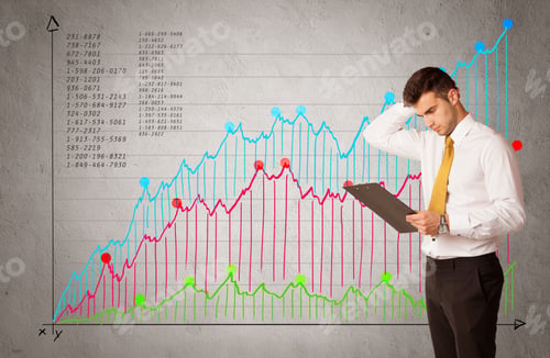 Preview: A Confident Young Businessman Standing In Front Of A A Chart With Graphs And Numberswhile Talking