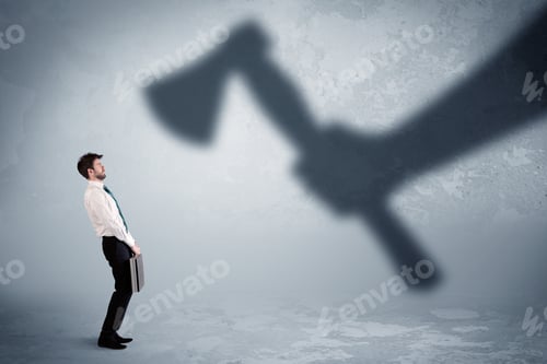 Preview: Businessman Afraid Of A Huge Shadow Hand Holding An Axe Concept On Background