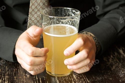 Preview: Business Hands Holding A Pint