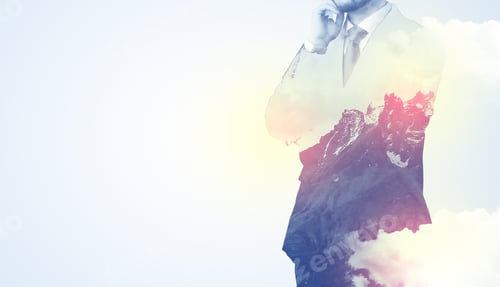 Preview: Businessman Standing And Thinking With Snowy Mountain Graphic