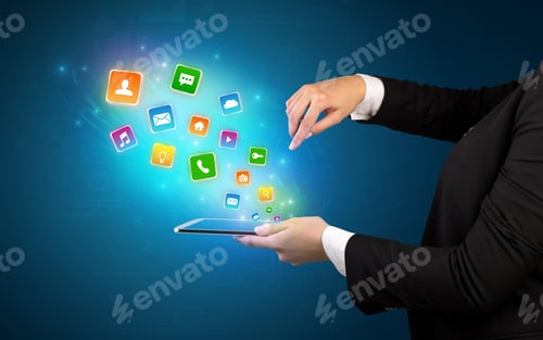 Preview: Hand Holding Tablet And Application Icons Falling Inwards