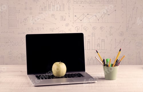 Preview: Close Up Of White Business Office Desk With Laptop Tablet In Front Of Brown Wall Background Full Of