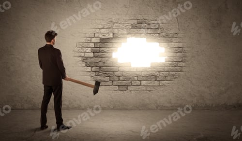 Preview: Business Man Hitting Brick Grungy Wall With Hammer And Opening A Hole
