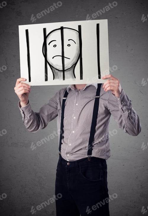 Preview: Businessman Holding A Paper With A Prisoner In Jail Behind The Bars On It In Front Of His Head