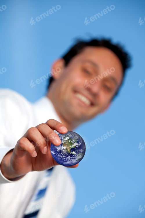 Preview: Business Man Holding The World In His Hands