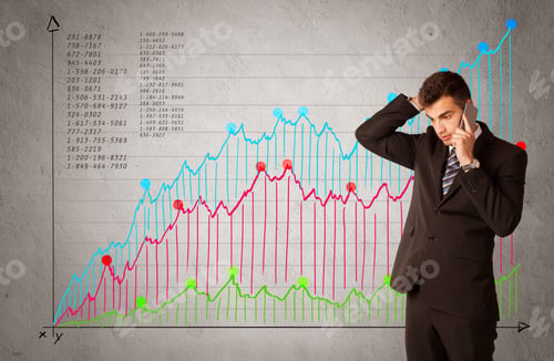 Preview: A Confident Young Businessman Standing In Front Of A A Chart With Graphs And Numberswhile Talking
