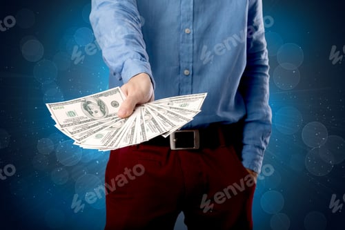 Preview: Young Businessman Holding Large Amount Of Bills With Shiny Blue Background