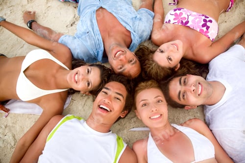 Preview: Happy Group Of Friends Smiling At The Beach