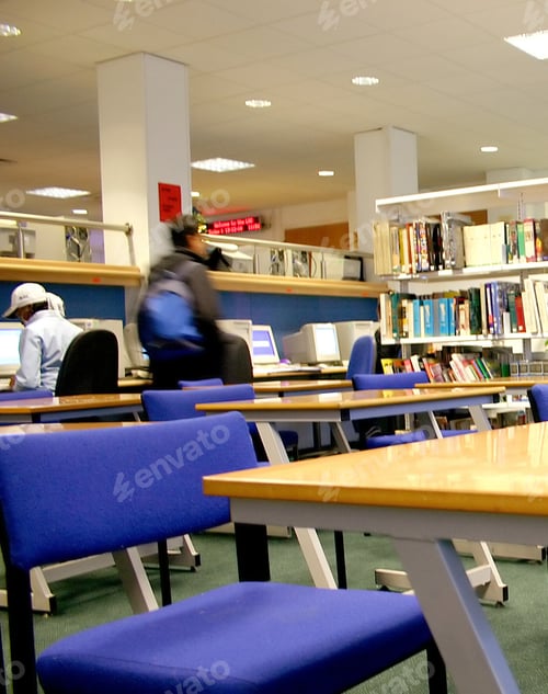 Preview: Students Studying At A Library