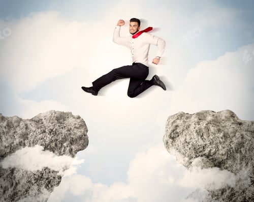 Preview: Happy Business Man Jumping Over A Cliff Concept