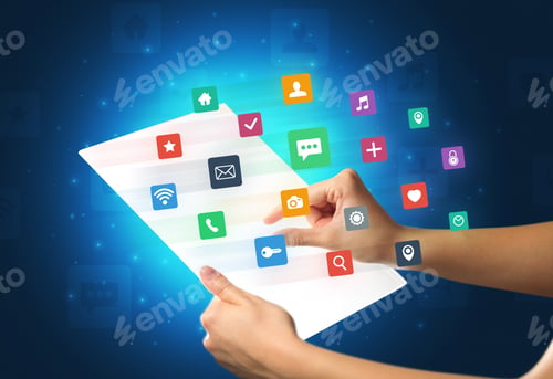Preview: Young Female Hand Holding A Tablet With Colorful Mixed Media Icons