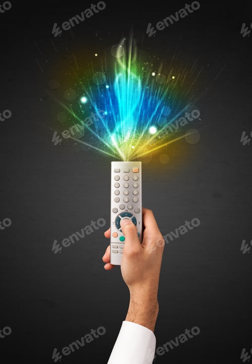 Preview: Hand Holding A Remote Control, Shining And Explosive Signal Coming Out Of It