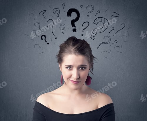Preview: A Pretty Teenage Girl Standing Confused In Front Of Grey Wall Background With Drawn Question Marks