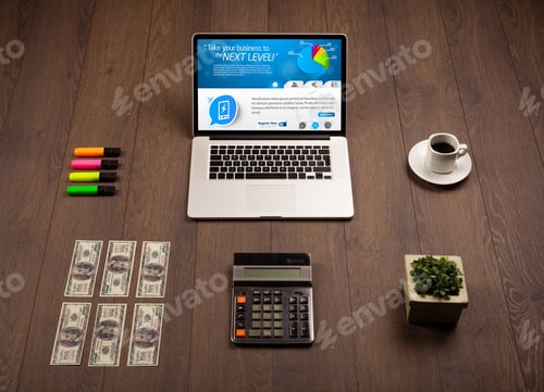 Preview: Laptop On Office Wooden Desk With Business Website On Screen