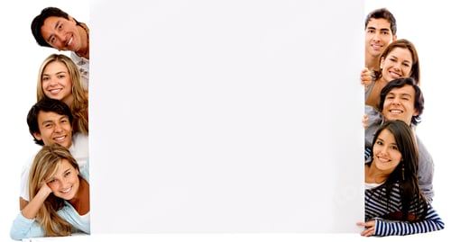 Preview: Happy Group Of Friends With A Banner Ad On The Floor Isolated Over White