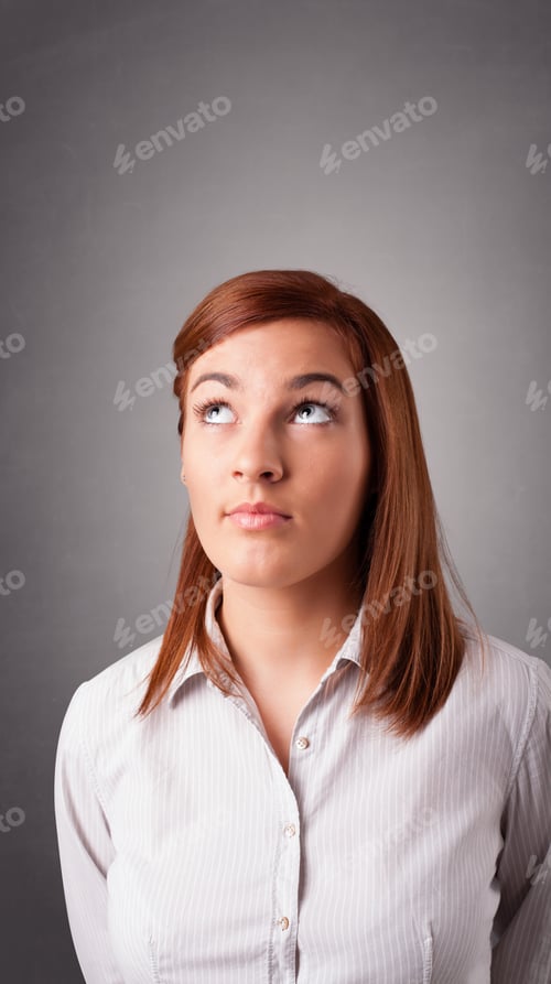 Preview: Beautiful Young Woman Standing And Thinking With Copy Space