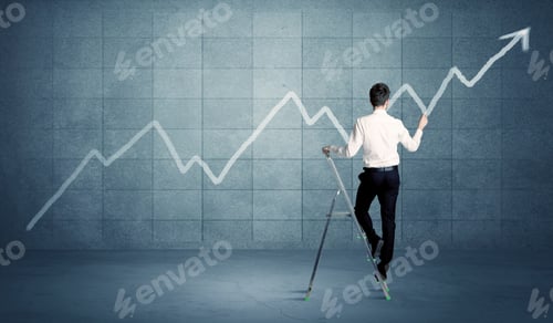 Preview: A Businessman In Modern Stylish Elegant Suit Standing On A Small Ladder And Drawing Pie And Block