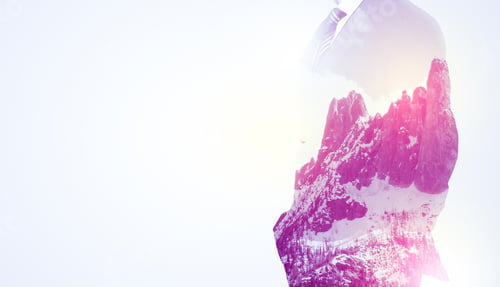 Preview: Young Businessman In Suit Standing With Sunny Snowy Mountain And Trees Graphic.