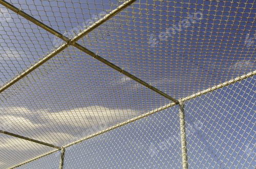 Preview: Part Of Batting Cage By Baseball Field