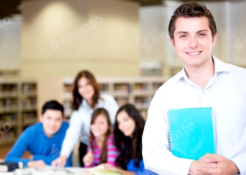 Preview: College Male Student With A Group At The Library