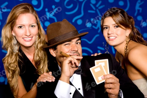 Preview: Group Of Attractive Poker Players Smiling, Blue Background