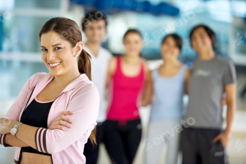 Preview: Beautiful Woman At The Gym And People Behind